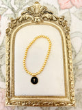 Gold and Black Cross Bracelet